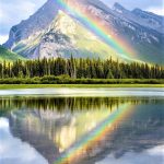 rainbow reflecting in Vermilion Lakes, canada