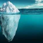 Why does ice float on water